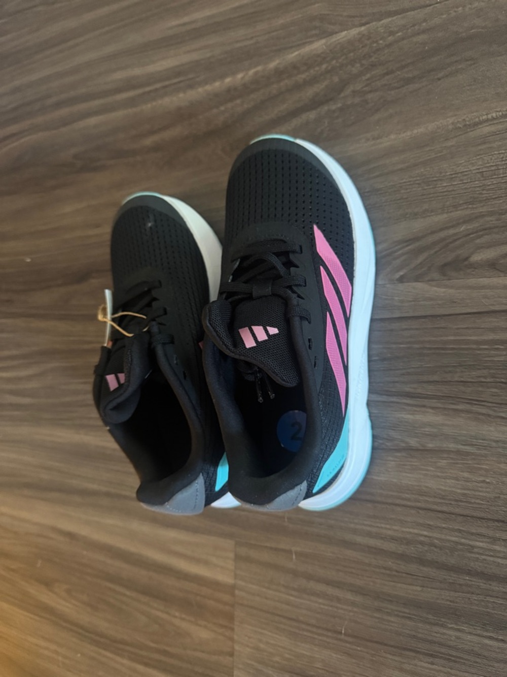 adidas Kids Black Sneakers with Pink and Teal Accents